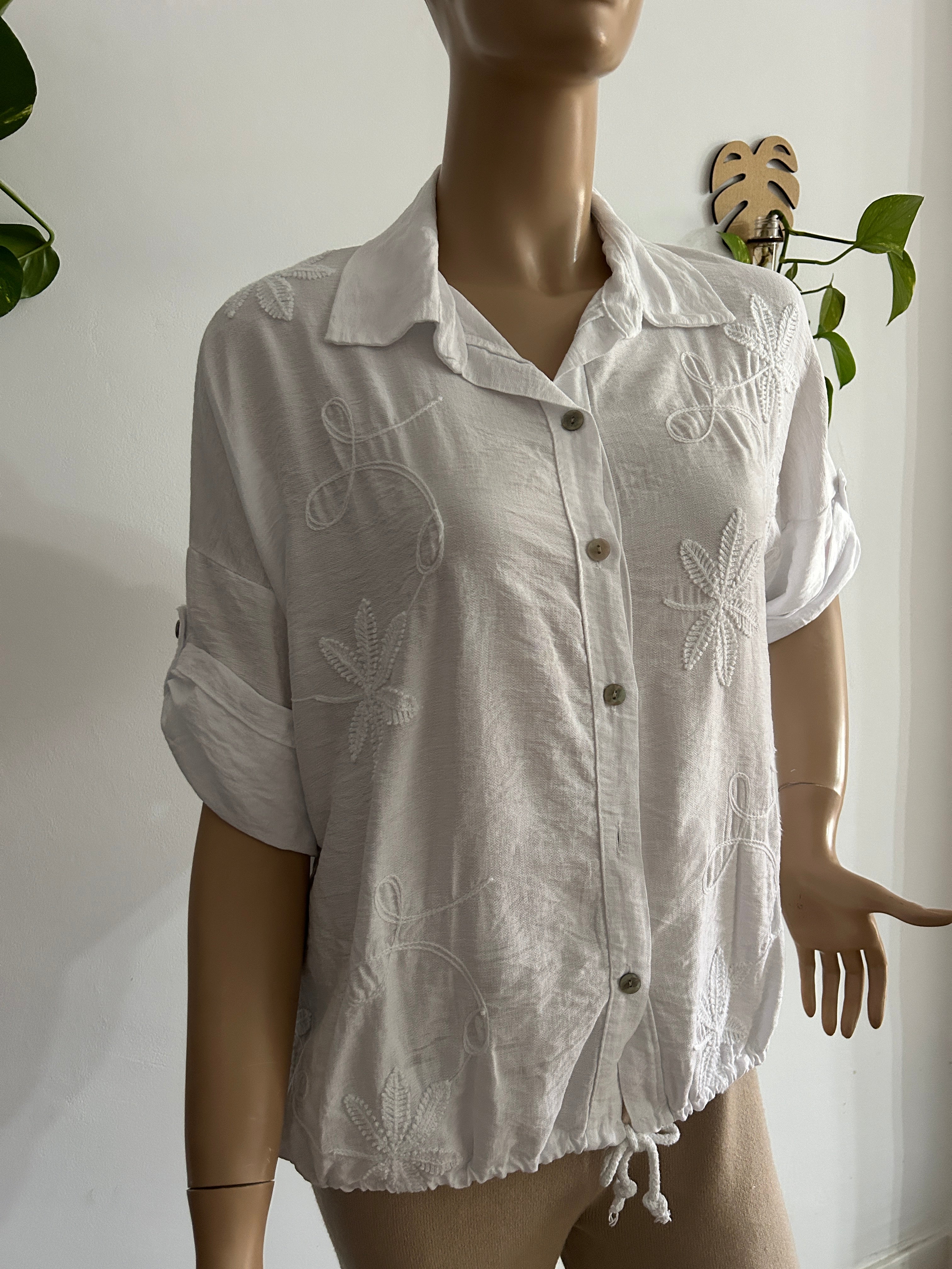 🤍 Blusa blanca bordada – básica elegante que combina con todo