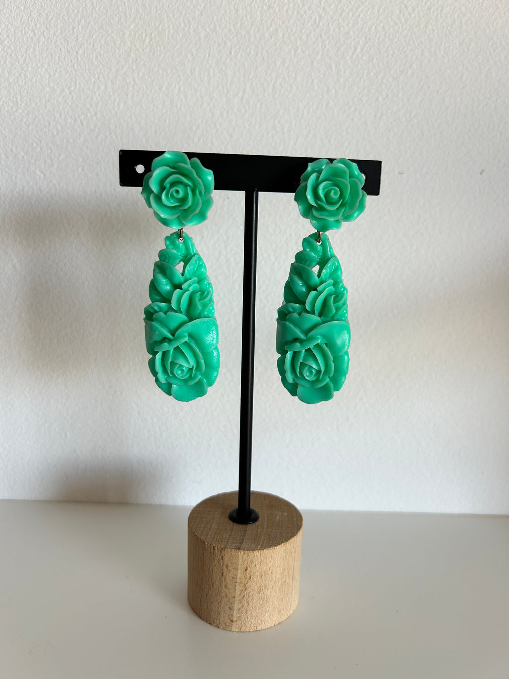 Pendientes de rosas en verde esmeralda