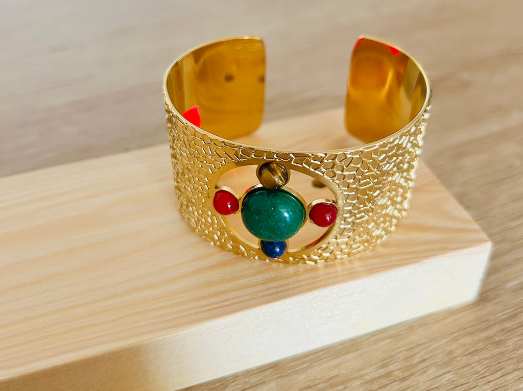 Brazalete dorado ajustable con piedras de color