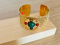 Brazalete dorado ajustable con piedras de color