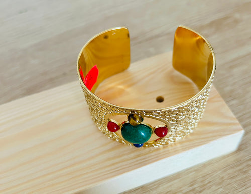 Brazalete dorado ajustable con piedras de color